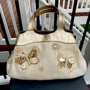 Reserved Coach Lexi butterfly straw purse f16564